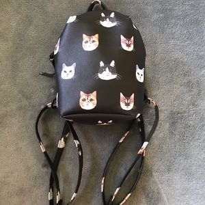 Small cute cat backpack.
